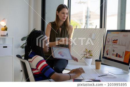 Marketing analysis accounting team meeting and working at company Marketing analysis accounting team meeting and working at company 103995895