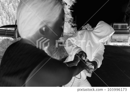 Man robbed woman, Thief stealing in public 103996173