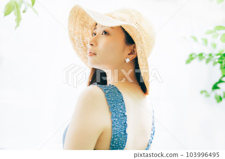 Young woman in summer clothes 103996495