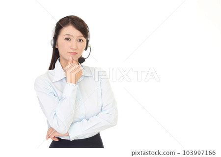 Thinking female operator Thinking female operator 103997166