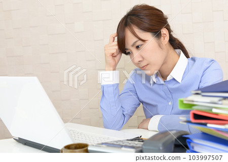 Office lady tired from computer work Office lady tired from computer work 103997507