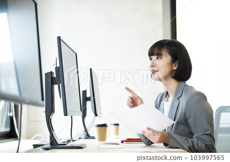 Office woman desk work computer smile 103997565