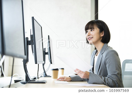 Office woman desk work computer smile Office woman desk work computer smile 103997569
