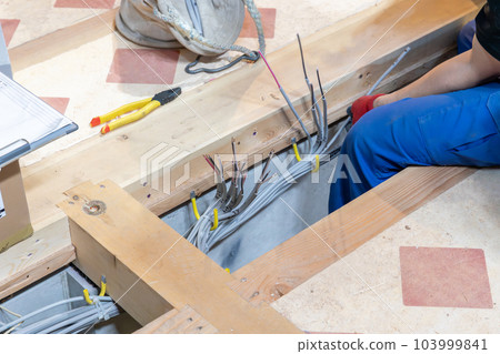 Wiring work under the floor of a new house Wiring work under the floor of a new house 103999841