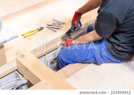 Wiring work under the floor of a new house Wiring work under the floor of a new house 103999842