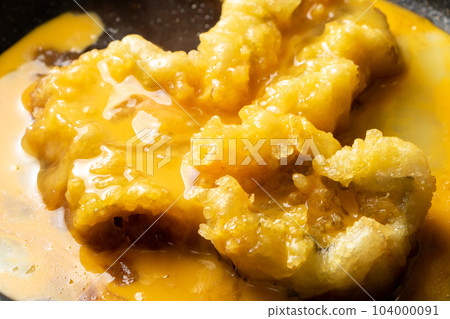 Tempura (conger eel) egg binding cooking scene. Fried leftovers remake image. Tempura (conger eel) egg binding cooking scene. Fried leftovers remake image. 104000091