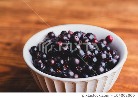 Bowl Full of Purple Amelanchier Lamarckii Fruits 104002000