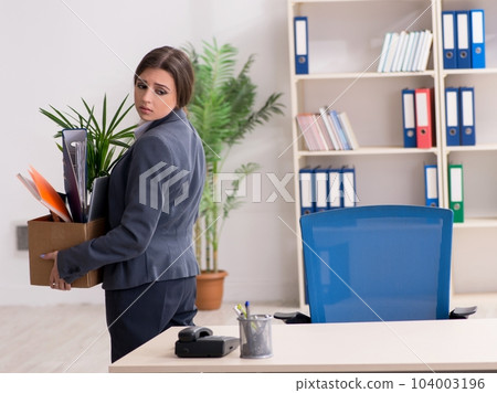 Dismissal and firing concept with woman employee Dismissal and firing concept with woman employee 104003196
