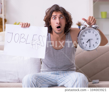 Unemployed man desperate at home Unemployed man desperate at home 104003921
