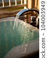 An image of a stylish open-air bath in the evening 104003949