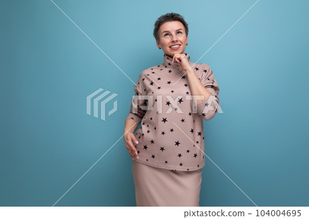 young caucasian boss woman with short gray hair in a skirt and blouse is dreaming looking up 104004695