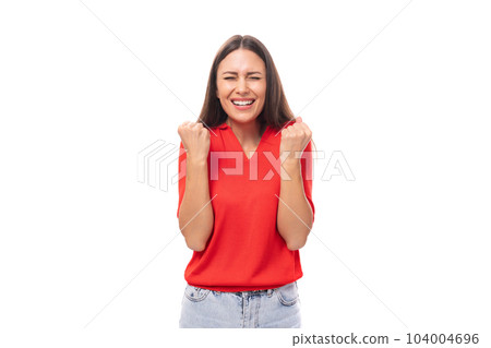 a young European woman with dark straight hair wearing a red short-sleeved shirt actively gestures 104004696