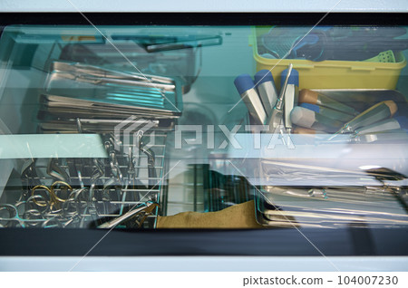 Selective focus ultraviolet autoclave sterilizer, sterilizing machine to sterile stainless steel dental instruments. UV thermostat in modern dentistry clinic. Sterilization. Disinfection with UV lamp. 104007230