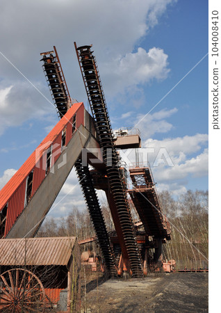 Old conveyor system at the former coking plant at the Zollverein colliery in Essen, Germany Old conveyor system at the former coking plant at the Zollverein colliery in Essen, Germany 104008410