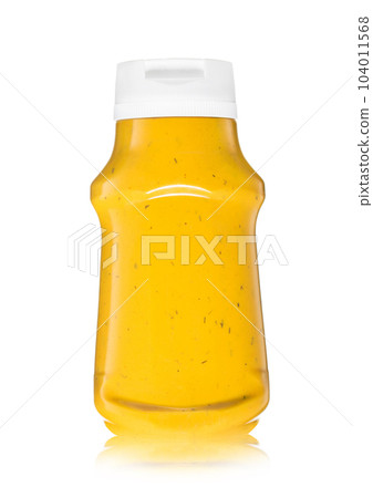 Hot dog creamy classic sauce with mustard in plastic bottle on white. 104011568