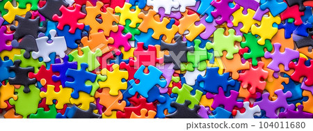 multi colored jigsaw puzzle on a pile. creative education in the form of a game, banner, made with Generative AI 104011680