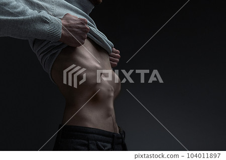 Anxiety. Human face silhouette appearing from male body, belly and screaming. Man suffering from social pressure. Conceptual collage. 104011897