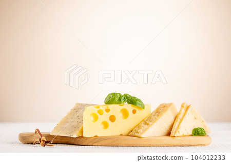 Various cheese on board 104012233