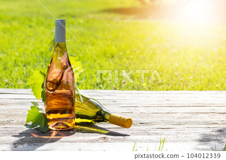 White and rose wine bottles 104012339