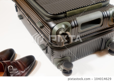 suitcase and leather shoes suitcase and leather shoes 104014629