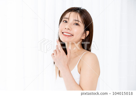 Young lady with tank top Young lady with tank top 104015018