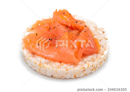 Rice Cake Sandwich with Fresh Salmon Slices Isolated on White Rice Cake Sandwich with Fresh Salmon Slices Isolated on White 104016305