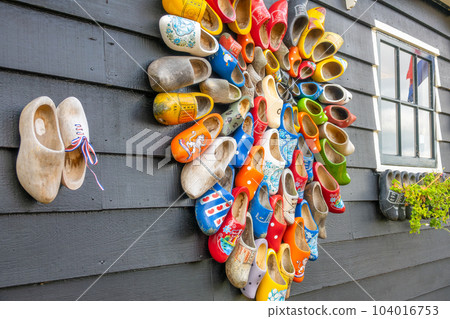 Dutch Clogs and a Window on the Wall of a Rural House Dutch Clogs and a Window on the Wall of a Rural House 104016753
