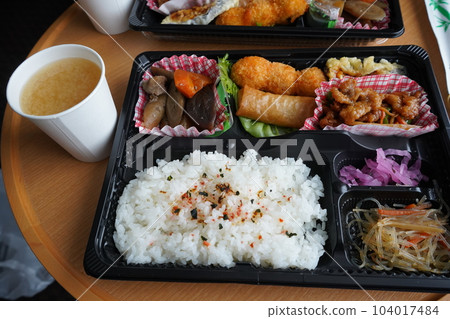 A brown bento box with almost no vegetables 104017484