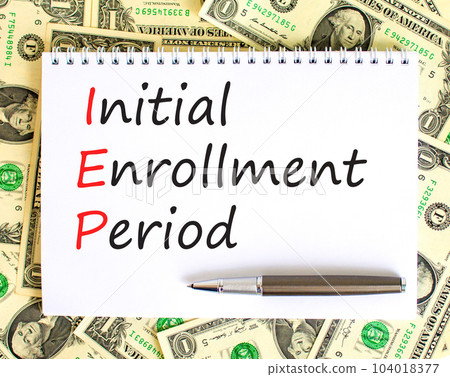 IEP symbol. Concept words IEP Initial enrollment period on beautiful white note. Dollar bills. Beautiful background from dollar bills. Medical and IEP Initial enrollment period concept. Copy space. IEP symbol. Concept words IEP Initial enrollment period on beautiful white note. Dollar bills. Beautiful background from dollar bills. Medical and IEP Initial enrollment period concept. Copy space. 104018377