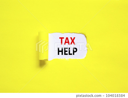 Tax help symbol. Concept words Tax help on beautiful white paper on a beautiful yellow background. Business, support and tax help concept. Copy space. Tax help symbol. Concept words Tax help on beautiful white paper on a beautiful yellow background. Business, support and tax help concept. Copy space. 104018384