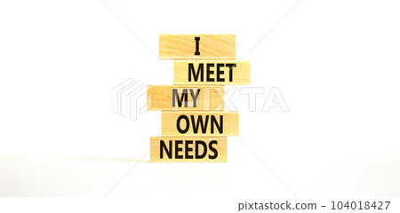 I meet my own needs symbol. Concept words I meet my own needs on wooden blocks. Beautiful white table white background. Business and i meet my own needs concept. Copy space. 104018427