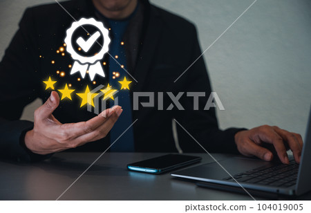 Give your business a boost with positive customer reviews Showcase your service rating with a hand holding five gold stars. Customer service and Satisfaction concept 104019005