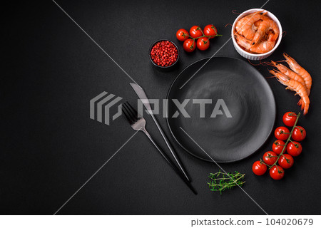 Ingredients for cooking cherry tomatoes, shrimp, salt and spices Ingredients for cooking cherry tomatoes, shrimp, salt and spices 104020679