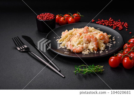 Delicious fresh penna pasta with shrimp, sauce, cheese, salt and spices Delicious fresh penna pasta with shrimp, sauce, cheese, salt and spices 104020681