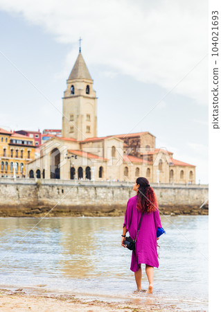 Gijon Asturias coast San lorenzo beach. Latin mid venezuelan tourist woman vacation destination 104021693