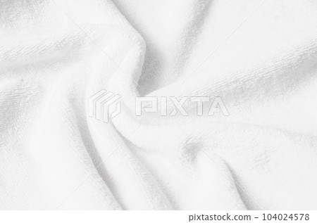 The Terry towel texture, top view of a white bath towel The Terry towel texture, top view of a white bath towel 104024578