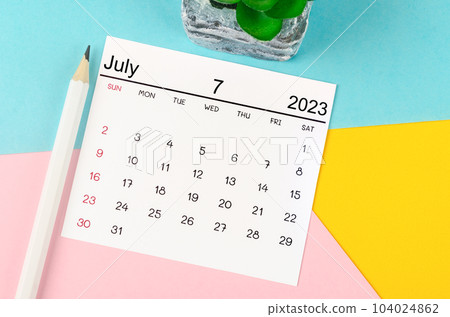 The July 2023 Monthly calendar for 2023 year with pen on beautiful background. The July 2023 Monthly calendar for 2023 year with pen on beautiful background. 104024862