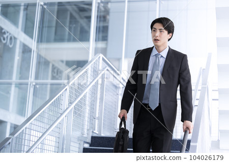 Airports, companies, office workers rushing to work or business trips. 104026179