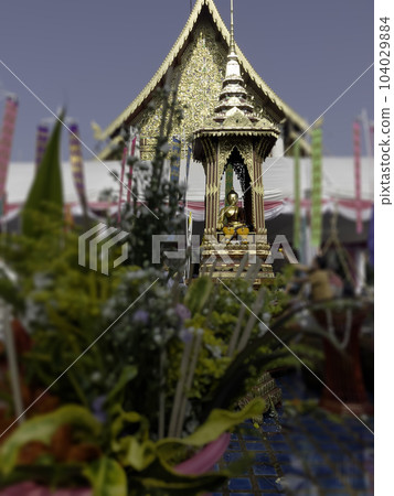 Crowd of people worshiping offering flowers attended a ceremony to worship the city pillar Crowd of people worshiping offering flowers attended a ceremony to worship the city pillar 104029884
