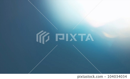 Mysterious white light on top right of navy background 104034034