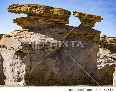 Rock formations in Bolivia at 16,000 feet elevation, carved by constant wind 104034316