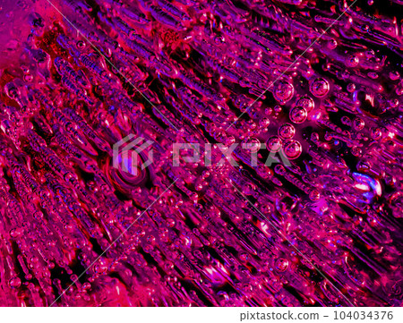 Macro images of streaming bubbles in ice with side lighting 104034376