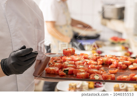 Chef is create appetizer dish Chef is create appetizer dish 104035553
