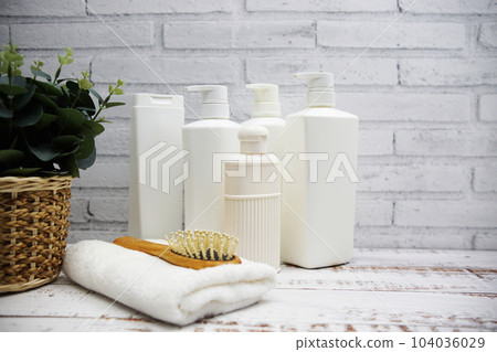 Clean towels, Shampoo, Liquid Soap with Other Toiletry and interior accessories with copy space 104036029