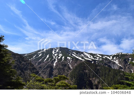Mt. Ontake, a sacred mountain with lingering snow Mt. Ontake, a sacred mountain with lingering snow 104036848