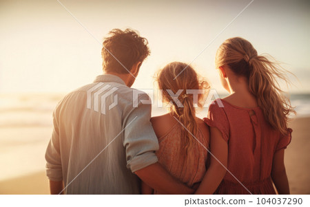 Young family on the seashore. Rest on the beach. 104037290
