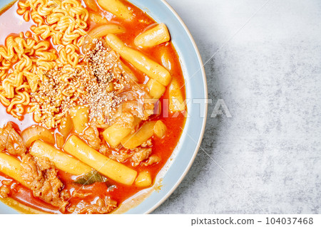 rabokki, Stir-fried Instant Noodle : This dish is tteokbokki with ramen noodles. Tteokbokki is a spicy dish made with rice cake, vegetables, and fish cake, all stir-fried together in a gochujang (red rabokki, Stir-fried Instant Noodle : This dish is tteokbokki with ramen noodles. Tteokbokki is a spicy dish made with rice cake, vegetables, and fish cake, all stir-fried together in a gochujang (red 104037468