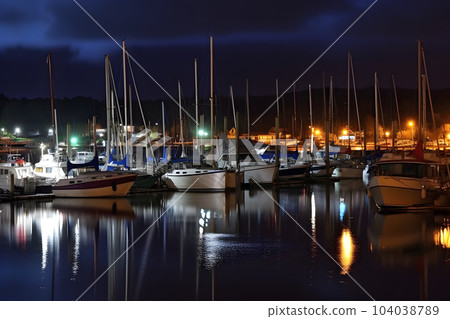 Boats in the harbor at night, neural network generated image 104038789