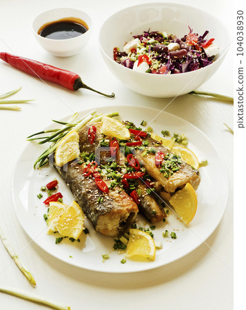 Baked hake fish 104038930