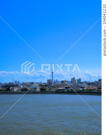 The Naka River and the blue sky flowing through Katsushika Okudo, Tokyo during the rainy season in June The Naka River and the blue sky flowing through Katsushika Okudo, Tokyo during the rainy season in June 104041210